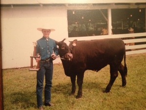 Matt at age 12, and his prize steer at the County Fair.